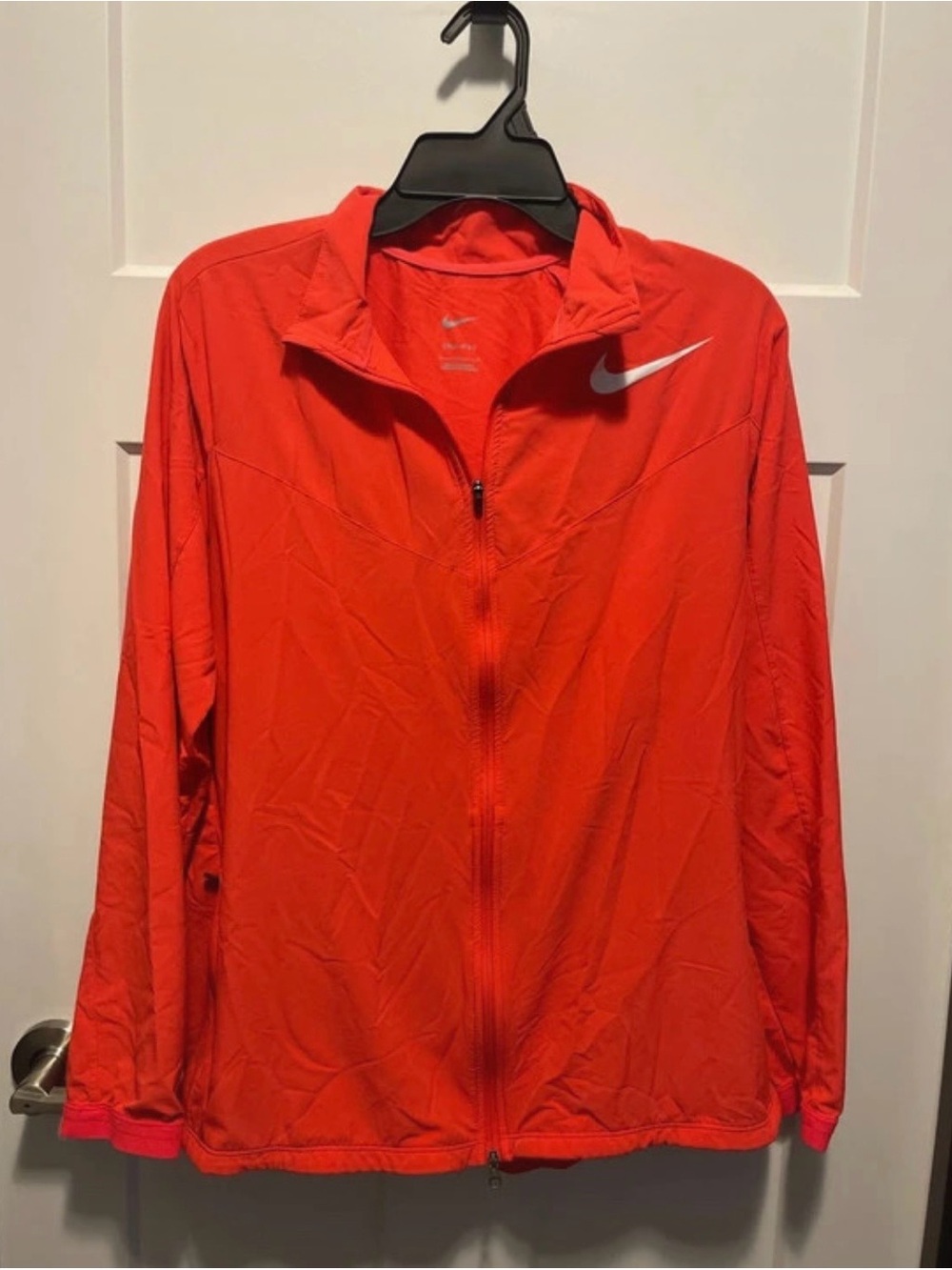 Nike Women’s Coral Orange Lightweight Full-Zip Jacket